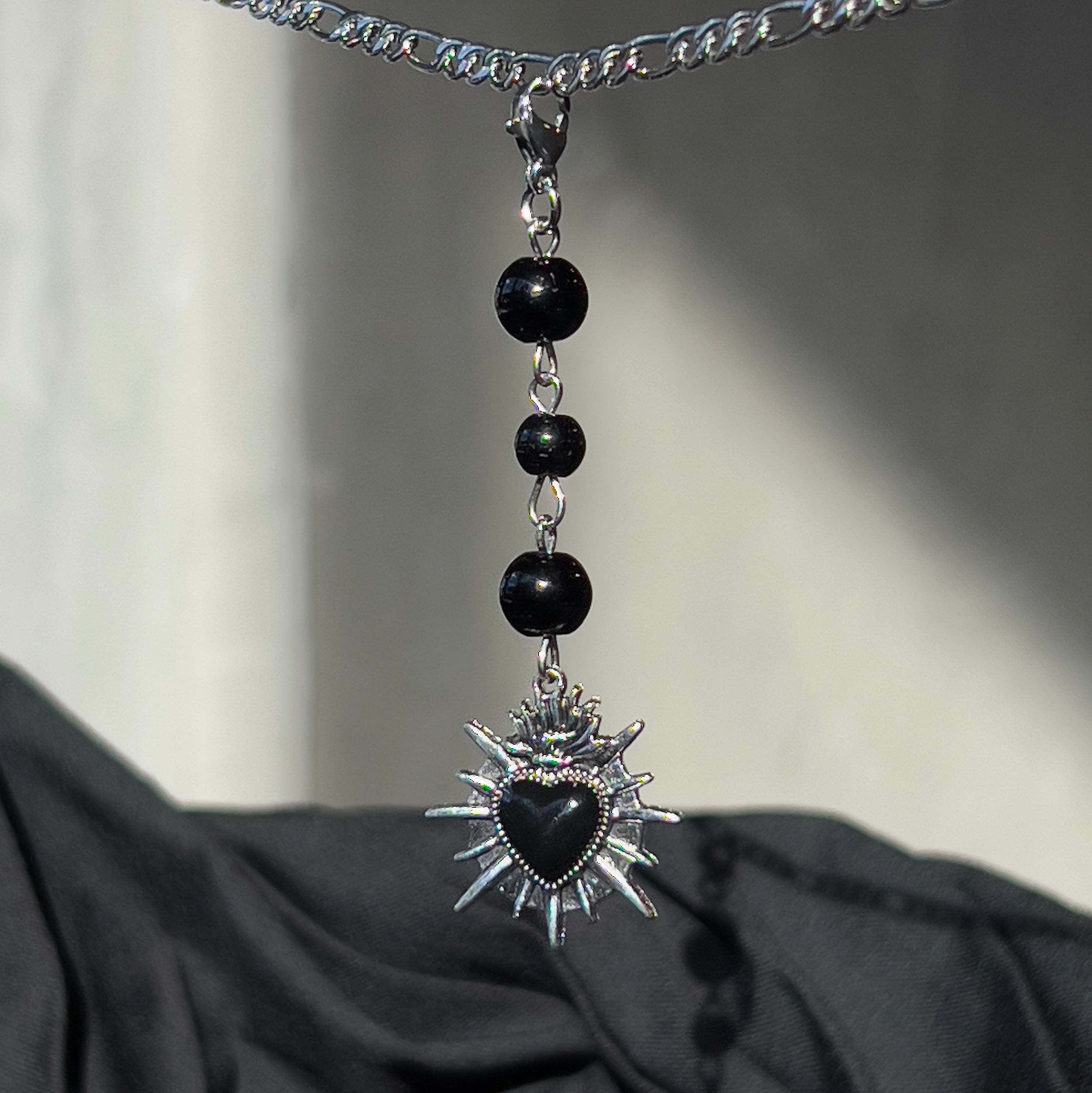 black heart chain charm